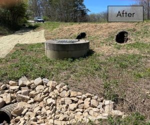 After image of a restored drainage area with a stabilized culvert, erosion control measures, and newly placed riprap for improved water flow management.