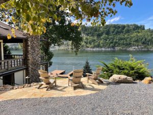 Patio with chairs overlooking the water