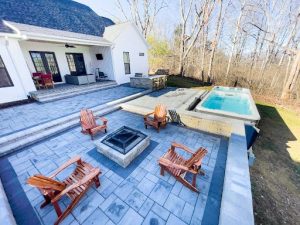 Patio around pool and with fire pit